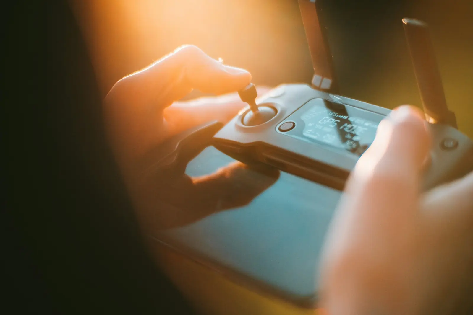 Hands holding a remote controller
